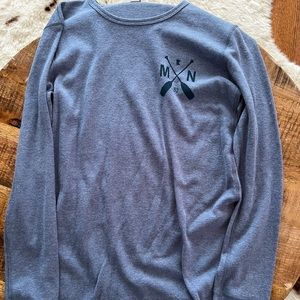 MN long sleeve shirt with the tags still attached.